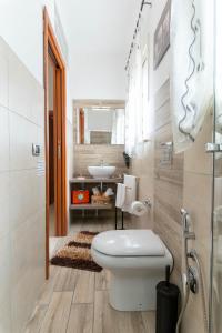 A bathroom at Appartamento Al Posto Giusto