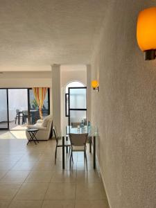 Χώρος καθιστικού στο Pelicano Inn Playa del Carmen - Beachfront Hotel