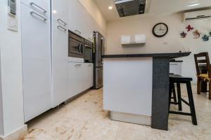 アクマルにあるLUXE 1-BR Condo in Bahia Principe - Multiple Poolsのギャラリーの写真