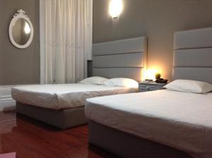 Cama o camas de una habitación en Royal Porto City