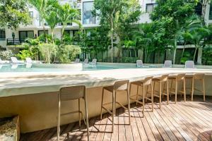 アクマルにあるLUXE 1-BR Condo in Bahia Principe - Multiple Poolsのギャラリーの写真