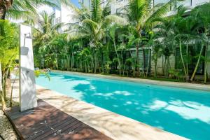 アクマルにあるLUXE 1-BR Condo in Bahia Principe - Multiple Poolsのギャラリーの写真