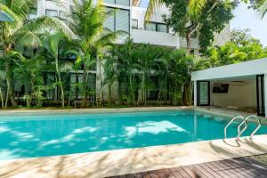 アクマルにあるLUXE 1-BR Condo in Bahia Principe - Multiple Poolsのギャラリーの写真