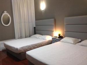 Cama o camas de una habitación en Royal Porto City