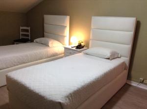 Cama o camas de una habitación en Royal Porto City