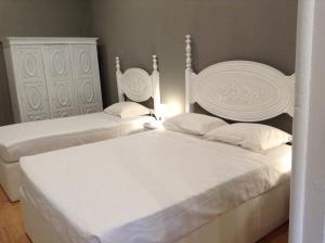 Cama o camas de una habitación en Royal Porto City