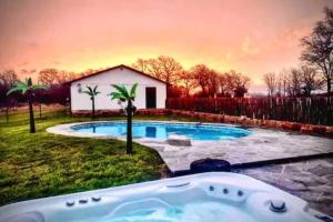 The swimming pool at or close to Saint Jo Retreat with Pool, Hot Tub, & Scenic Views - Near Winery
