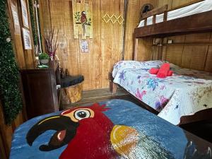Ένα ή περισσότερα κρεβάτια σε δωμάτιο στο Hostel Rústico MarAbi