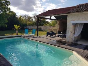 The swimming pool at or close to Appealing holiday home in Loubigné with private pool