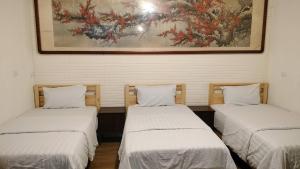 水源棧客房内的一张或多张床位