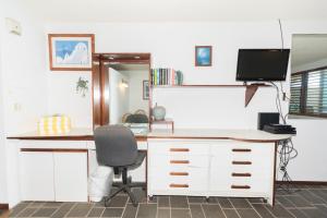 Et tv og/eller underholdning på Napili Bay Steps from Ocean! nb204 - Sullivan