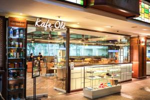 a store front of a bakery with a sign on it at Holiday Villa Resort & Beachclub Langkawi in Pantai Cenang