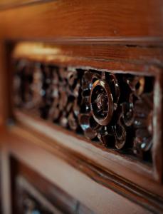 a close up of a wooden drawer with a mechanism at Kathmandu View Hotel in Kathmandu