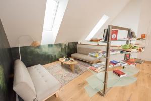 a living room with a couch and a table at Naturparkbauernhof Pöltl in Pöllau