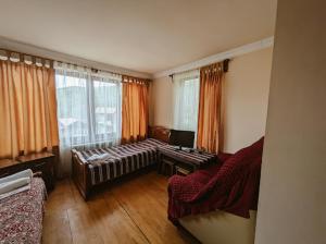 Postel nebo postele na pokoji v ubytování Gosh hotel