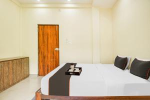 Ένα ή περισσότερα κρεβάτια σε δωμάτιο στο Hotel Joaquim Near Baga Beach
