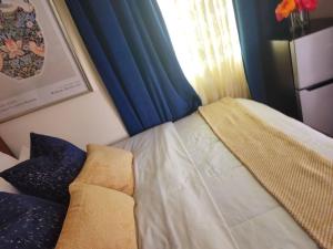 Postel nebo postele na pokoji v ubytování Cozy Tiny Private GuestSuite
