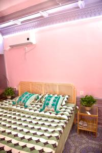 Cama o camas de una habitación en 浪子小栈 Kashgar Ancient City