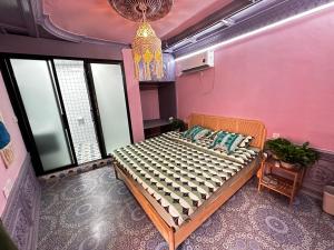 Cama o camas de una habitación en 浪子小栈 Kashgar Ancient City