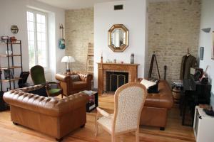 Posezení v ubytování La Villa Mirabelle 2min d'Arromanches-les-Bains + 37 fotografií