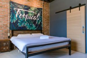 Postel nebo postele na pokoji v ubytování 9BR Neverland Loft Pool Villa