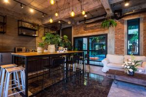 Posezení v ubytování 9BR Neverland Loft Pool Villa