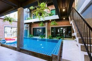 Bazén v ubytování 9BR Neverland Loft Pool Villa nebo v jeho okolí