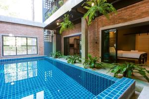 Bazén v ubytování 9BR Neverland Loft Pool Villa nebo v jeho okolí