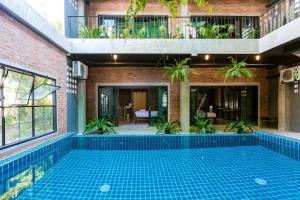 Bazén v ubytování 9BR Neverland Loft Pool Villa nebo v jeho okolí