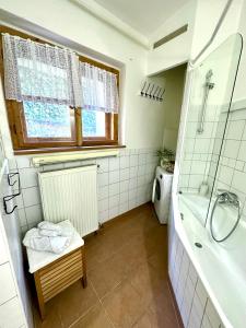 A bathroom at Stylish historical apartment + BACKYARD