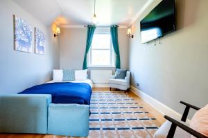 Voodi või voodid majutusasutuse Large 1 Bedroom in Center of London (4) toas