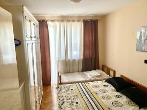 Postel nebo postele na pokoji v ubytování Apartment Riva