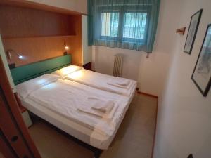 Postel nebo postele na pokoji v ubytování Andreis Apartments