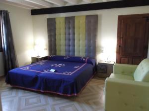Postel nebo postele na pokoji v ubytování Hotel Termal Abadia de Los Templarios