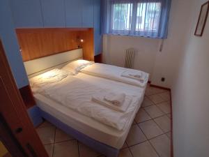 Postel nebo postele na pokoji v ubytování Andreis Apartments