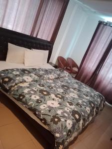 מיטה או מיטות בחדר ב-AL KHALEEJ HOTEL