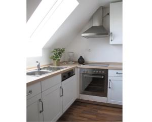 Kuchyň nebo kuchyňský kout v ubytování Ferienwohnung Schmidbauer