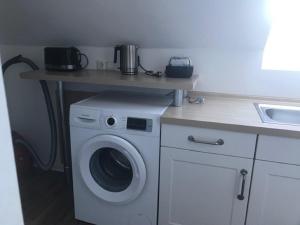 Kuchyň nebo kuchyňský kout v ubytování Ferienwohnung Schmidbauer