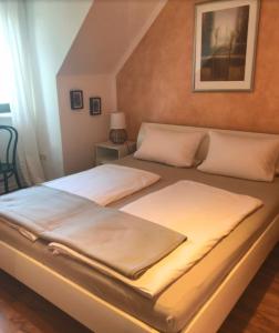 Postel nebo postele na pokoji v ubytování Ferienwohnung Schmidbauer