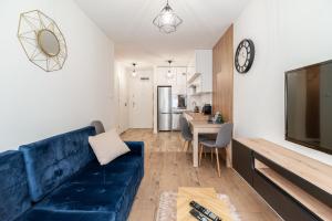 Kuchyňa alebo kuchynka v ubytovaní Horyzont Apartamenty - Kapitański Mostek- BLISKO PORTU- Śniadania