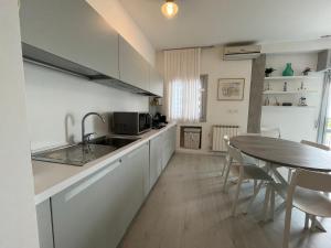 Кухня или кухненски бокс в Appartamento Esagono
