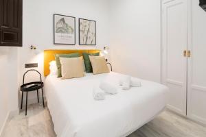 Granadi Apartamentos客房内的一张或多张床位