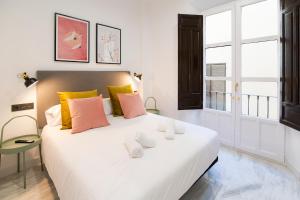 Granadi Apartamentos客房内的一张或多张床位
