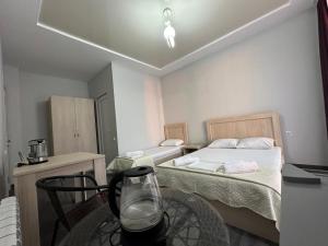 Postel nebo postele na pokoji v ubytování Guest House 99