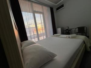 Postel nebo postele na pokoji v ubytování Guest House 99