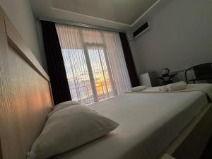 Postel nebo postele na pokoji v ubytování Guest House 99