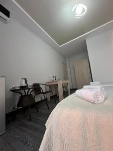Postel nebo postele na pokoji v ubytování Guest House 99