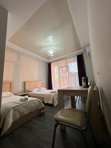 Postel nebo postele na pokoji v ubytování Guest House 99