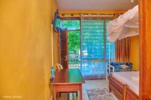 Postel nebo postele na pokoji v ubytování PRIMESHADE GUESTHOUSE