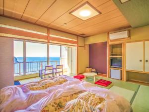 和歌山市にある双子島荘のベッドルーム1室(ベッド1台付)が備わります。